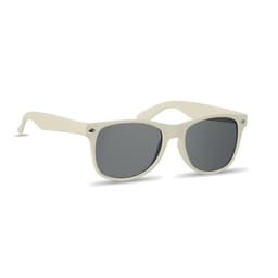 A pair of cream-coloured sunglasses with dark lenses and a logo on the side.