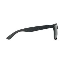 A pair of black sunglasses with a sleek design and dark lenses, featuring a subtle logo on the side.