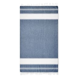 A blue and white striped towel with tassels, featuring a denim-like texture and a simple design.