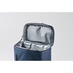 A navy blue insulated cooler bag with a silver lining, featuring an open top and a zip closure.