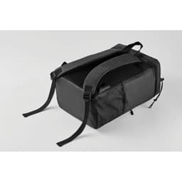 A black promotional bag with adjustable straps and mesh side panels. It has a rectangular shape and a sturdy design.