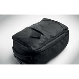 A black bag with a smooth finish and a flap closure, featuring a small mobile device on top. It has a logo.