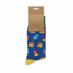 A pair of bright blue socks featuring colourful ice cream and burger patterns, with a cardboard tag attached.