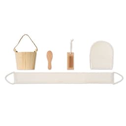 A collection of self-care items including a wooden bucket, a scoop, a tag, and a natural fabric pouch.