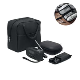 A black carry bag with various smaller pouches, scissors, and a portable radio. The items are neatly arranged.