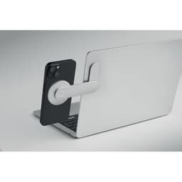 A smartphone holder in a sleek white design, attached to a laptop, providing hands-free access.