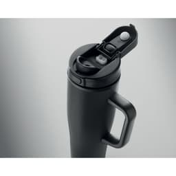 A drink bottle in matte black with a handle and a flip-top lid featuring two openings.