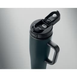 A drink bottle in dark green with a black lid and handle, featuring a built-in spout and button.