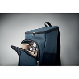 A backpack in navy blue with a zippered compartment and a patterned interior, featuring a handle at the top.