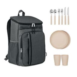 A grey backpack with a top flap alongside beige plates, cups, and cutlery set. The backpack features a logo.