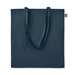 A dark blue tote bag with long handles and a tag on the side. The design is simple and unadorned.
