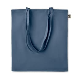 A blue tote bag with long handles and a tag on the side.