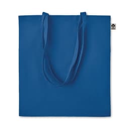 A blue tote bag with two handles and a small logo tag on the side.
