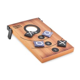 A bean bag toss game with a wooden board, featuring target circles and three bean bags in black and white.