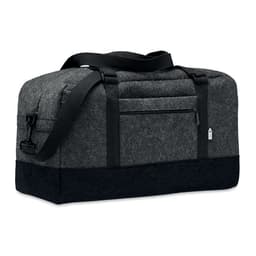 A grey and black Indico Bag with a shoulder strap, featuring zippered and pocket compartments.