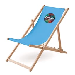 A deck chair with a blue fabric seat and a wooden frame, featuring a circular logo on the backrest.