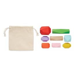 A collection of geometric shape toys in various colours, alongside a small beige drawstring bag.