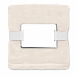 A soft beige blanket with a white band and rectangular holder in the centre, featuring no visible branding.