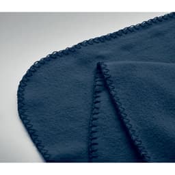 A navy blue blanket with a stitched edge, folded to display its texture and design.