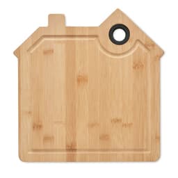 A bamboo cutting board shaped like a house, featuring a hole for hanging. It's natural wood in colour.