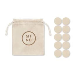 A cotton drawstring bag in beige containing ten round beige tokens, featuring a logo on the bag.
