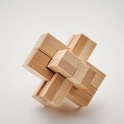 A wooden puzzle comprised of interlocking cube shapes in a natural finish, featuring various textures and grains.