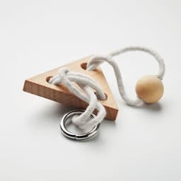A wooden triangle toy with three holes, a white rope, and a wooden ball, secured with a metal ring.
