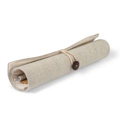A rolled-up canvas organiser in a light beige colour, secured with a string and button.