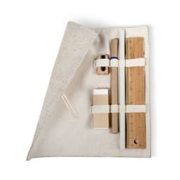 A canvas pouch in natural tones containing a ruler, pencil, sharpener, eraser, and piece of cardboard.
