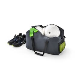 A dark grey duffle bag filled with a soccer ball and sports shoes, featuring green accents and a logo.