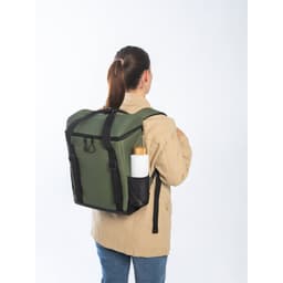 A thermal backpack in olive green with a padded design and a drink bottle secured in the side pocket, featuring a logo.