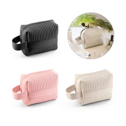 A collection of three handbags in black, pink, and cream, featuring a textured design and a side handle.