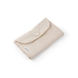 A foldable bag in beige, made of cotton, recycled cotton, and polyester, featuring a logo.