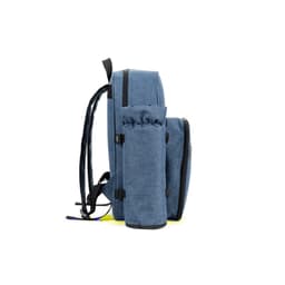 A blue picnic cooler backpack with a side drink holder and adjustable straps. It features a zippered main compartment and branding.