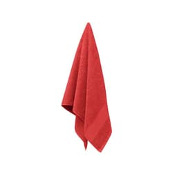 A red towel hangs neatly, showcasing its soft texture and vibrant colour. It includes a subtle logo on the corner.
