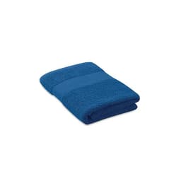 A folded blue towel with a textured band, featuring a logo on one side.