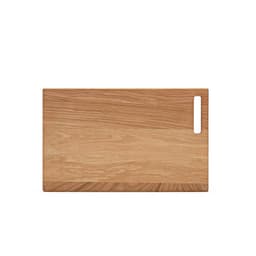 A wooden chopping board in a light oak finish featuring a built-in handle. It has a smooth, natural texture.