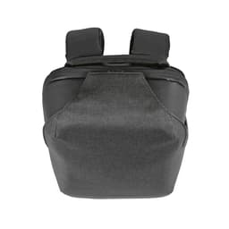 A grey backpack with a sleek design, featuring shoulder straps and a branding logo.