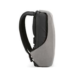 A grey backpack with a black panel, featuring a TSA lock and anti-cut fabric design. It has adjustable straps.