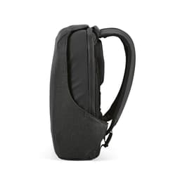 A backpack in dark grey fabric with a streamlined design, featuring a TSA lock and anticut fabric technology.
