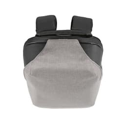 A grey and black backpack featuring a TSA lock and anticut fabric, with adjustable straps and a compact design.