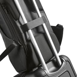 A black backpack featuring a TSA lock, anticut fabric, and harness for attaching to luggage.