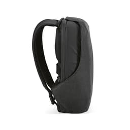 A dark grey backpack with a sleek design, featuring a TSA lock and anti-cut fabric. It has a logo.