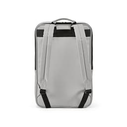 A grey backpack with adjustable straps and a top handle, featuring a logo on the exterior.