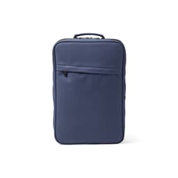 A navy blue backpack featuring a front zippered pocket and a handle, suitable for a 17" laptop. It has a logo.