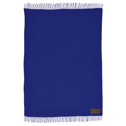 A blue blanket with fringed edges and a patch for customisation at the corner.