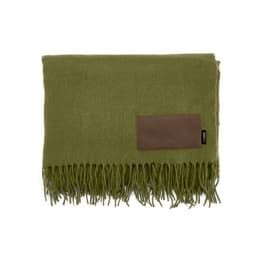 A green blanket with fringed edges and a brown customisable patch. It features a logo on one side.