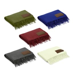 A collection of Lichtenstein Blankets in green, blue, burgundy, grey, and cream with fringed edges and a customisable patch.