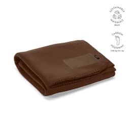 A brown Pollock blanket made from rPET, featuring a customisable patch and a logo.