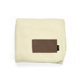 A cream blanket made from rPET material with a brown customisable patch. It features a neat stitched edge.